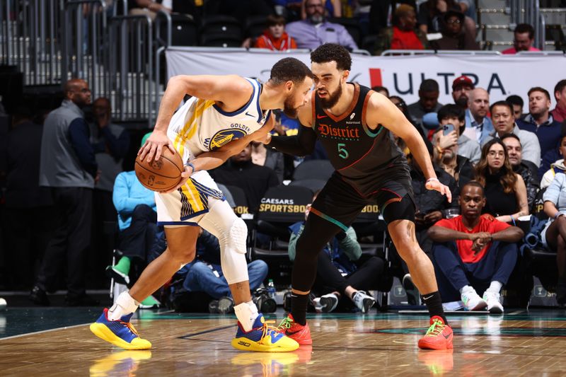 WASHINGTON, DC -? FEBRUARY 27: Tyus Jones #5 of the Washington Wizards plays defense against the Golden State Warriors on February 27, 2024 at Capital One Arena in Washington, DC. NOTE TO USER: User expressly acknowledges and agrees that, by downloading and or using this Photograph, user is consenting to the terms and conditions of the Getty Images License Agreement. Mandatory Copyright Notice: Copyright 2024 NBAE (Photo by Kenny Giarla/NBAE via Getty Images)