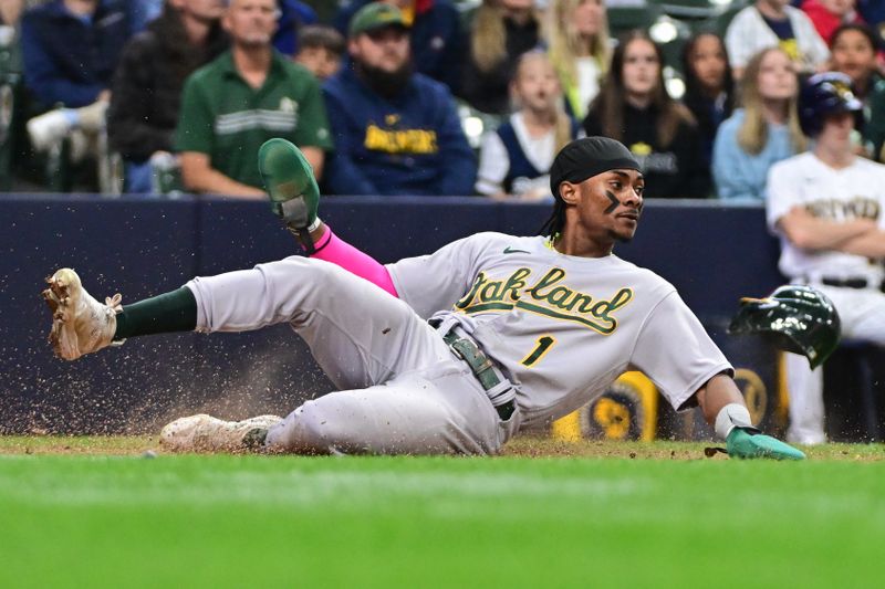 Jun 11, 2023; Milwaukee, Wisconsin, USA;  Oakland Athletes center fielder Esteury Ruiz (1) scores a run against the Milwaukee Brewers in the ninth inning at American Family Field. Mandatory Credit: Benny Sieu-USA TODAY Sports