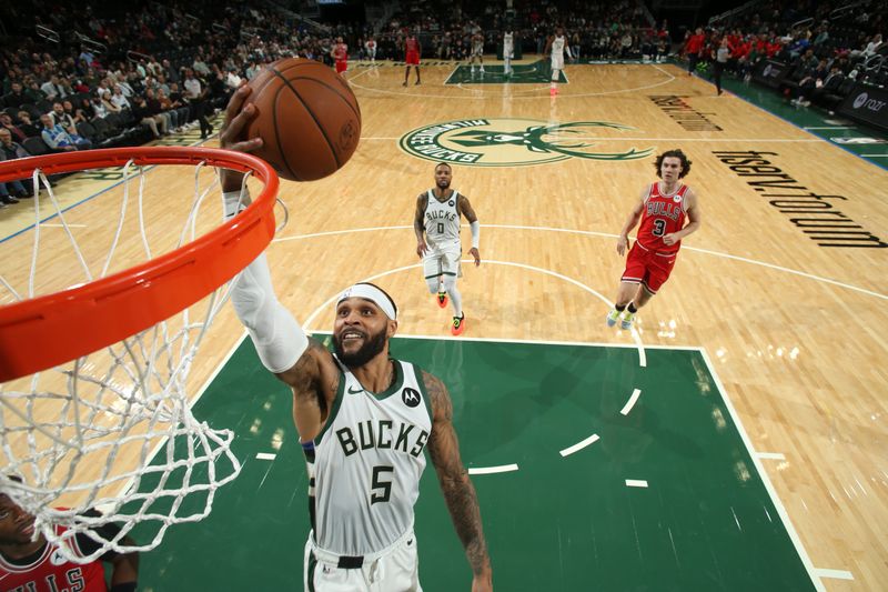 MILWAUKEE, WI - OCTOBER 14:  Gary Trent Jr. #5 of the Milwaukee Bucks lay up against the Chicago Bulls on October 14, 2024 at Fiserv Forum Center in Milwaukee, Wisconsin. NOTE TO USER: User expressly acknowledges and agrees that, by downloading and or using this Photograph, user is consenting to the terms and conditions of the Getty Images License Agreement. Mandatory Copyright Notice: Copyright 2024 NBAE (Photo by Gary Dineen/NBAE via Getty Images).