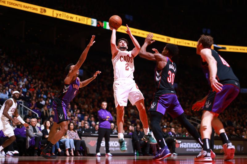 TORONTO, CANADA - OCTOBER 23: Ty Jerome #2 of the Cleveland Cavaliers drives to the basket during the game against the Toronto Raptors on October 23, 2024 at the Scotiabank Arena in Toronto, Ontario, Canada.  NOTE TO USER: User expressly acknowledges and agrees that, by downloading and or using this Photograph, user is consenting to the terms and conditions of the Getty Images License Agreement.  Mandatory Copyright Notice: Copyright 2024 NBAE (Photo by Vaughn Ridley/NBAE via Getty Images)