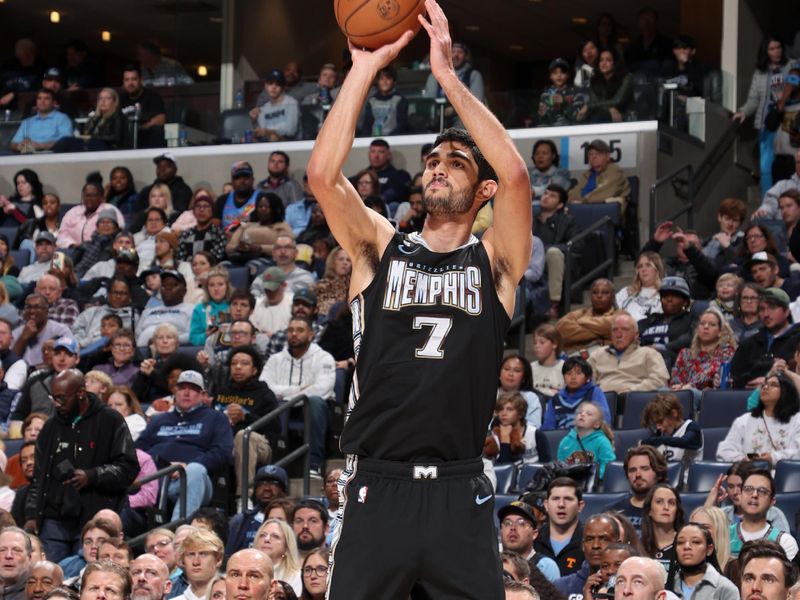 MEMPHIS, TN - NOVEMBER 18: Santi Aldama #7 of the Memphis Grizzlies shoots a three point basket during the game against the Oklahoma City Thunder on November 18, 2022 at FedExForum in Memphis, Tennessee. NOTE TO USER: User expressly acknowledges and agrees that, by downloading and or using this photograph, User is consenting to the terms and conditions of the Getty Images License Agreement. Mandatory Copyright Notice: Copyright 2022 NBAE (Photo by Joe Murphy/NBAE via Getty Images)