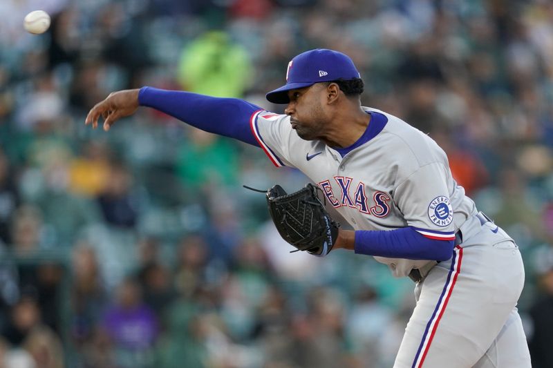 Apr 23, 2025; West Sacramento, California, USA; Texas Rangers pitcher Kumar Rocker (80) delivers a pitch against the Athletics in the first inning at Sutter Health Park. Mandatory Credit: Cary Edmondson-Imagn Images