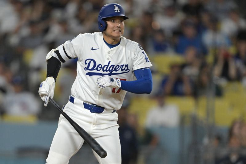 May 21, 2025; Los Angeles, California, USA;  Los Angeles Dodgers designated hitter Shohei Ohtani (17) reacts after hitting a foul ball down the right field line in the eighth inning against the Arizona Diamondbacks at Dodger Stadium. Mandatory Credit: Jayne Kamin-Oncea-Imagn Images