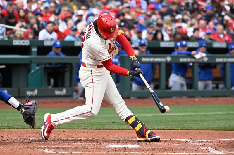 Apr 1, 2023; St. Louis, Missouri, USA; St. Louis Cardinals third baseman Nolan Arenado (28) hits an RBI double against the Toronto Blue Jays in the third inning at Busch Stadium. Mandatory Credit: Joe Puetz-USA TODAY Sports