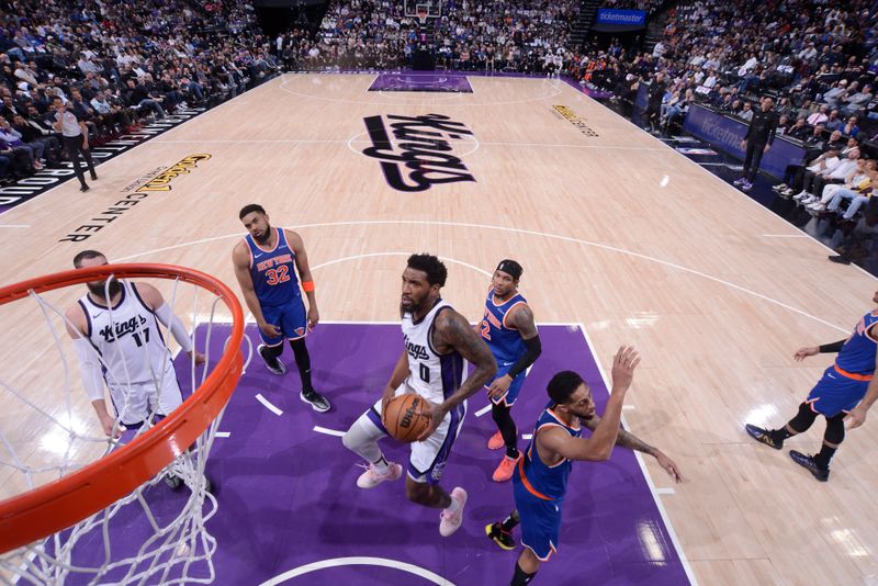 SACRAMENTO, CA - MARCH 10:  Malik Monk #0 of the Sacramento Kings drives to the basket during the game against the New York Knicks on March 10, 2025 at Golden 1 Center in Sacramento, California. NOTE TO USER: User expressly acknowledges and agrees that, by downloading and or using this Photograph, user is consenting to the terms and conditions of the Getty Images License Agreement. Mandatory Copyright Notice: Copyright 2025 NBAE (Photo by Rocky Widner/NBAE via Getty Images)