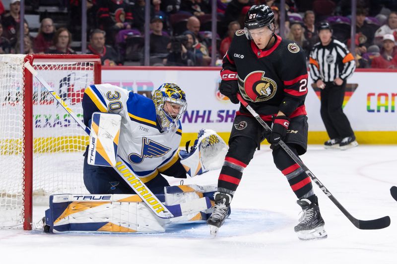 Mar 21, 2024; Ottawa, Ontario, CAN; St. Louis Blues goalie Joel Hofer (30) sets up to make a save in front of Ottawa Senators defenseman Jakoc Chychrun (6) in the first period at the Canadian Tire Centre. Mandatory Credit: Marc DesRosiers-USA TODAY Sports