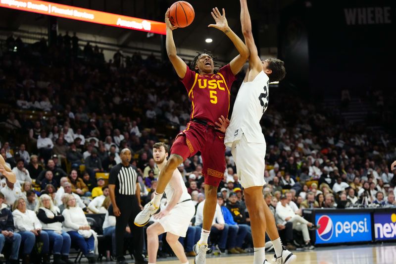 Feb 23, 2023; Boulder, Colorado, USA; USC Trojans guard Boogie Ellis (5) shoots the ball over Colorado Buffaloes forward Tristan da Silva (23) in the second half at the CU Events Center. Mandatory Credit: Ron Chenoy-USA TODAY Sports