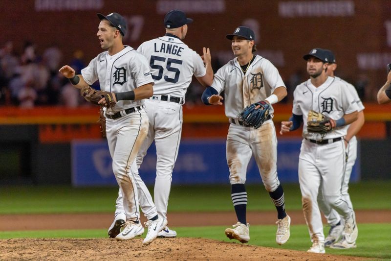 Aug 22, 2023; Detroit, Michigan, USA; Detroit Tigers relief pitcher Alex Lange (55) shakes hands with teammates after the win against the Chicago Cubs at Comerica Park. Mandatory Credit: David Reginek-USA TODAY Sports