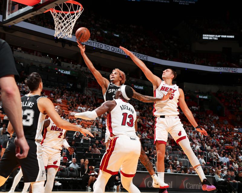 MIAMI, FL - OCTOBER 15: Jeremy Sochan #10 of the San Antonio Spurs shoots the ball during the game on October 15, 2024 at Kaseya Center in Miami, Florida. NOTE TO USER: User expressly acknowledges and agrees that, by downloading and or using this Photograph, user is consenting to the terms and conditions of the Getty Images License Agreement. Mandatory Copyright Notice: Copyright 2024 NBAE (Photo by Issac Baldizon/NBAE via Getty Images)