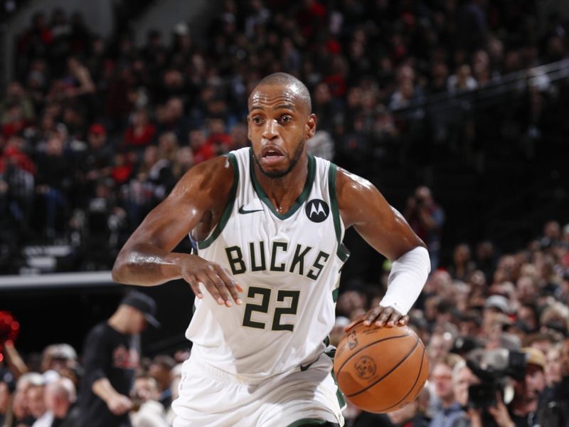 PORTLAND, OR - JANUARY 31:  Khris Middleton #22 of the Milwaukee Bucks goes to the basket during the game on January 31, 2024 at the Moda Center Arena in Portland, Oregon. NOTE TO USER: User expressly acknowledges and agrees that, by downloading and or using this photograph, user is consenting to the terms and conditions of the Getty Images License Agreement. Mandatory Copyright Notice: Copyright 2024 NBAE (Photo by Cameron Browne/NBAE via Getty Images)