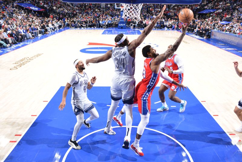 PHILADELPHIA, PA - DECEMBER 6: Paul George #8 of the Philadelphia 76ers drives to the basket during the game against the Orlando Magic on December 6, 2024 at the Wells Fargo Center in Philadelphia, Pennsylvania NOTE TO USER: User expressly acknowledges and agrees that, by downloading and/or using this Photograph, user is consenting to the terms and conditions of the Getty Images License Agreement. Mandatory Copyright Notice: Copyright 2024 NBAE (Photo by Jesse D. Garrabrant/NBAE via Getty Images)