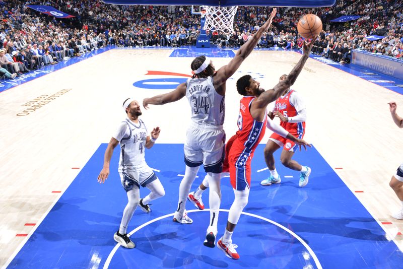 PHILADELPHIA, PA - DECEMBER 6: Paul George #8 of the Philadelphia 76ers drives to the basket during the game against the Orlando Magic on December 6, 2024 at the Wells Fargo Center in Philadelphia, Pennsylvania NOTE TO USER: User expressly acknowledges and agrees that, by downloading and/or using this Photograph, user is consenting to the terms and conditions of the Getty Images License Agreement. Mandatory Copyright Notice: Copyright 2024 NBAE (Photo by Jesse D. Garrabrant/NBAE via Getty Images)