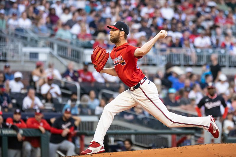 Aug 23, 2024; Cumberland, Georgia, USA; Atlanta Braves pitcher Chris Sale (51) pitches against Washington Nationals during the third inning at Truist Park. Mandatory Credit: Jordan Godfree-USA TODAY Sports