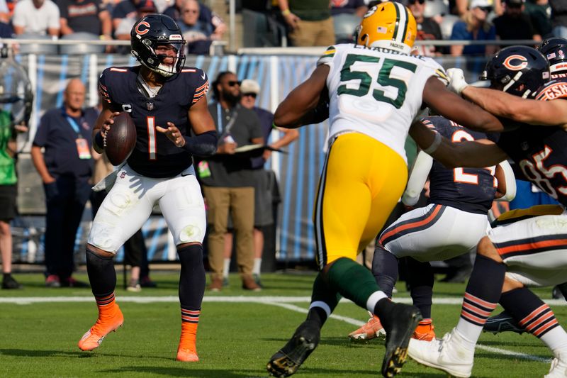 Chicago Bears quarterback Justin Fields looks to pass against the Green Bay Packers during the first half of an NFL football game in Chicago, Sunday, Sept. 10, 2023. (AP Photo/Nam Y. Huh)