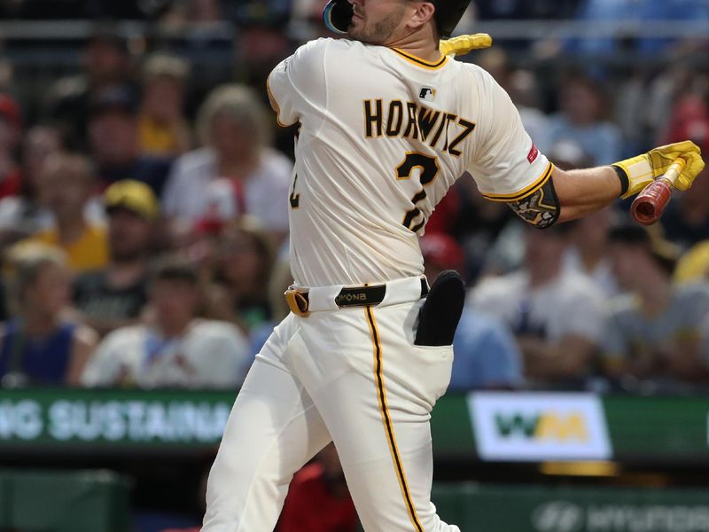 Jun 30, 2025; Pittsburgh, Pennsylvania, USA;  Pittsburgh Pirates first baseman Spencer Horwitz (2) hits a two-run double against the St. Louis Cardinals during the fifth inning at PNC Park. Mandatory Credit: Charles LeClaire-Imagn Images