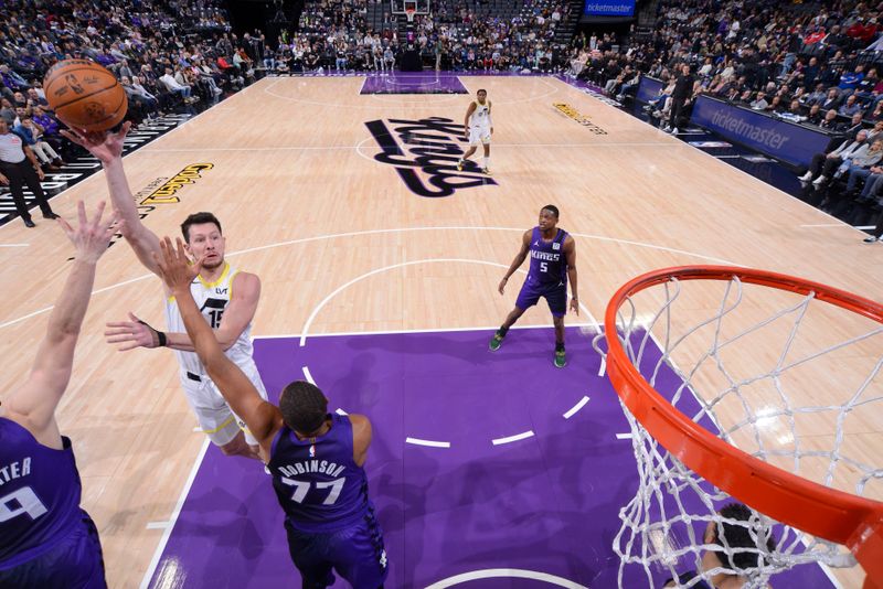 SACRAMENTO, CA - DECEMBER 8: Drew Eubanks #15 of the Utah Jazz shoots the ball during the game against the Sacramento Kings on December 8, 2024 at Golden 1 Center in Sacramento, California. NOTE TO USER: User expressly acknowledges and agrees that, by downloading and or using this Photograph, user is consenting to the terms and conditions of the Getty Images License Agreement. Mandatory Copyright Notice: Copyright 2024 NBAE (Photo by Rocky Widner/NBAE via Getty Images)