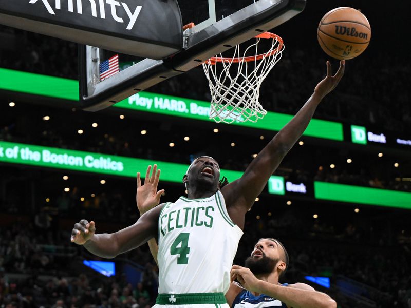 BOSTON, MASSACHUSETTS - NOVEMBER 24: Jrue Holiday #4 of the Boston Celtics attempts a layup against the Minnesota Timberwolves during the first quarter at the TD Garden on November 24, 2024 in Boston, Massachusetts. NOTE TO USER: User expressly acknowledges and agrees that, by downloading and or using this photograph, User is consenting to the terms and conditions of the Getty Images License Agreement. (Photo by Brian Fluharty/Getty Images)