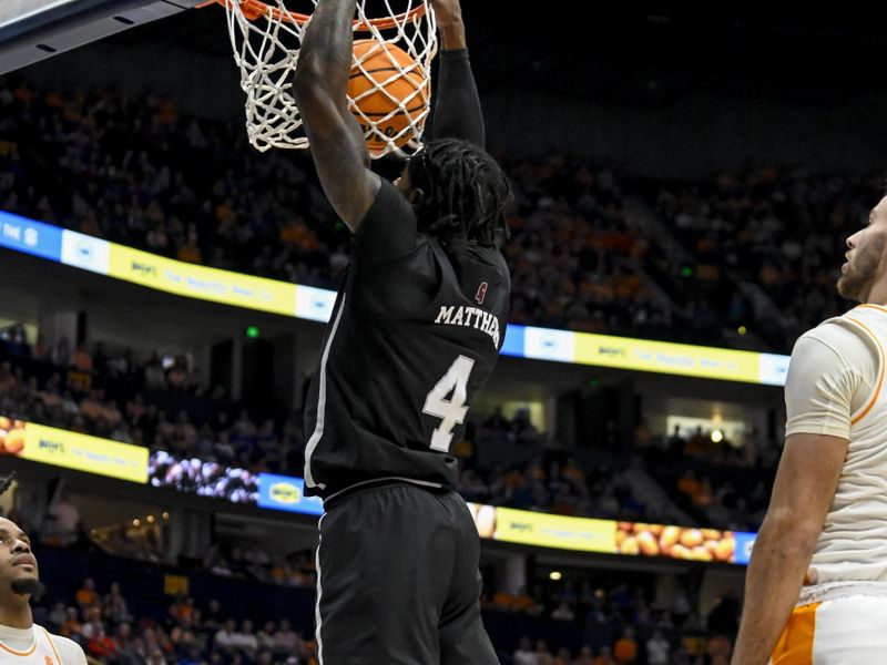 Mar 15, 2024; Nashville, TN, USA; Mississippi State Bulldogs forward Cameron Matthews (4) lays the ball in against the Tennessee Volunteers during the first half at Bridgestone Arena. Mandatory Credit: Steve Roberts-USA TODAY Sports