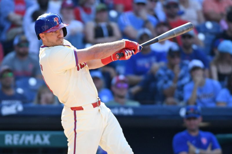 Sep 15, 2024; Philadelphia, Pennsylvania, Philadelphia Phillies catcher J.T. Realmuto (10) hits a walk-off RBI single during the ninth inning against the New York Mets USA; at Citizens Bank Park. Mandatory Credit: Eric Hartline-Imagn Images