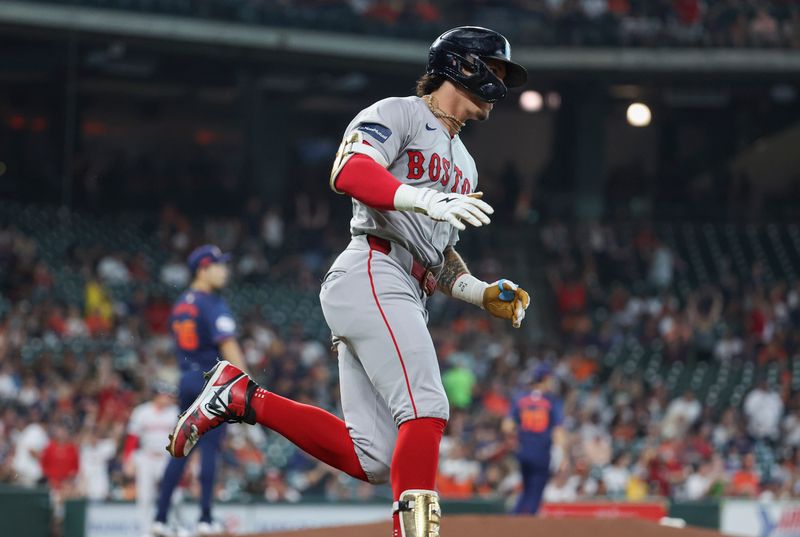 Aug 19, 2024; Houston, Texas, USA; Houston Astros starting pitcher Yusei Kikuchi (16) reacts and Boston Red Sox center fielder Jarren Duran (16) rounds the bases after hitting a home run during the first inning at Minute Maid Park. Mandatory Credit: Troy Taormina-USA TODAY Sports