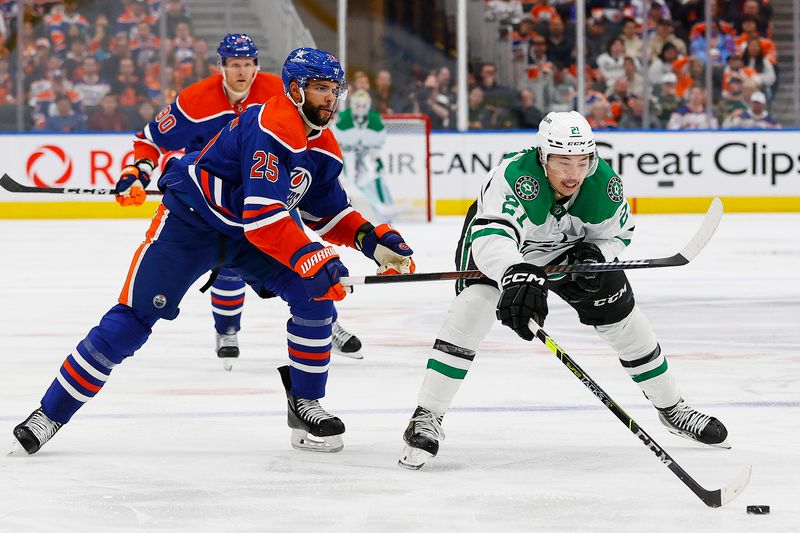 May 29, 2024; Edmonton, Alberta, CAN;   Edmonton Oilers defensemen Darnell Nurse (25) tries to knock the puck away from Dallas Stars forward Jason Robertson (21) during the second period in game four of the Western Conference Final of the 2024 Stanley Cup Playoffs at Rogers Place. Mandatory Credit: Perry Nelson-USA TODAY Sports