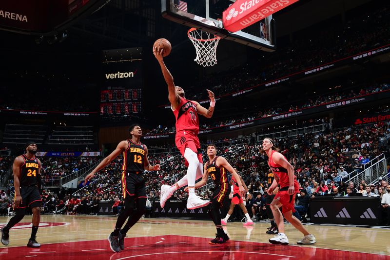 ATLANTA, GA - February 23:  Bruce Brown #11 of the Toronto Raptors drives to the basket during the game against the Atlanta Hawks on February 23, 2024 at State Farm Arena in Atlanta, Georgia.  NOTE TO USER: User expressly acknowledges and agrees that, by downloading and/or using this Photograph, user is consenting to the terms and conditions of the Getty Images License Agreement. Mandatory Copyright Notice: Copyright 2024 NBAE (Photo by Scott Cunningham/NBAE via Getty Images)