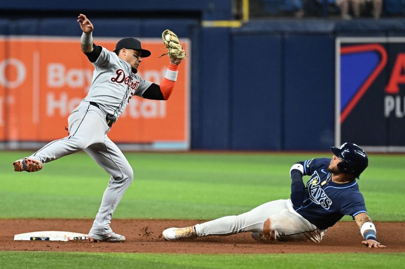 Apr 23, 2024; St. Petersburg, Florida, USA; Detroit Tigers shortstop Javier Baez (28) prepares to tag out Tampa Bay Rays designated hitter Harold Ramirez (43) in the sixth inning at Tropicana Field. Mandatory Credit: Jonathan Dyer-USA TODAY Sports