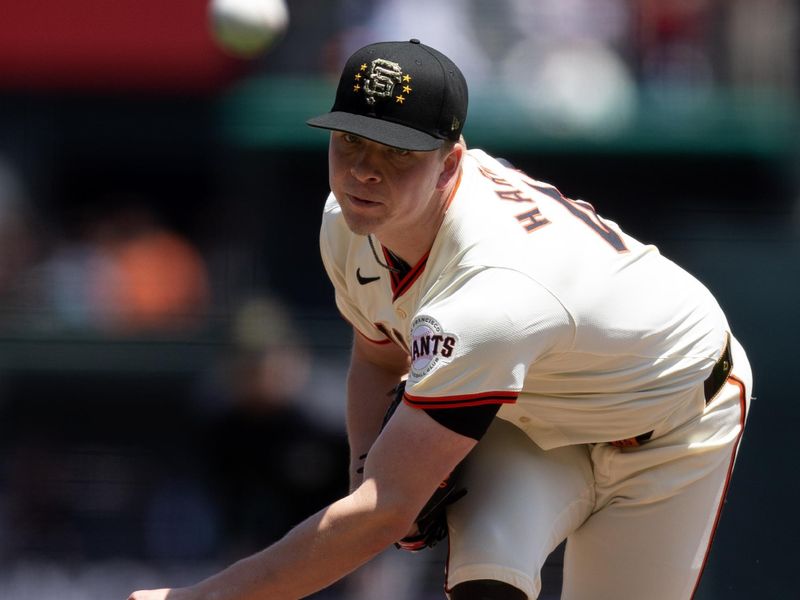 May 18, 2024; San Francisco, California, USA; San Francisco Giants starting pitcher Kyle Harrison (45) delivers a pitch against the Colorado Rockies during the first inning at Oracle Park. Mandatory Credit: D. Ross Cameron-USA TODAY Sports