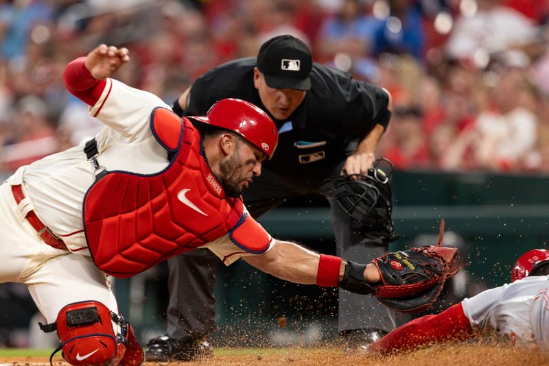 Sep 30, 2023; St. Louis, Missouri, USA; Cincinnati Reds shortstop Noelvi Marte (16) is called out at home plate in the second inning against the St. Louis Cardinals at Busch Stadium. Mandatory Credit: Zach Dalin-USA TODAY Sports