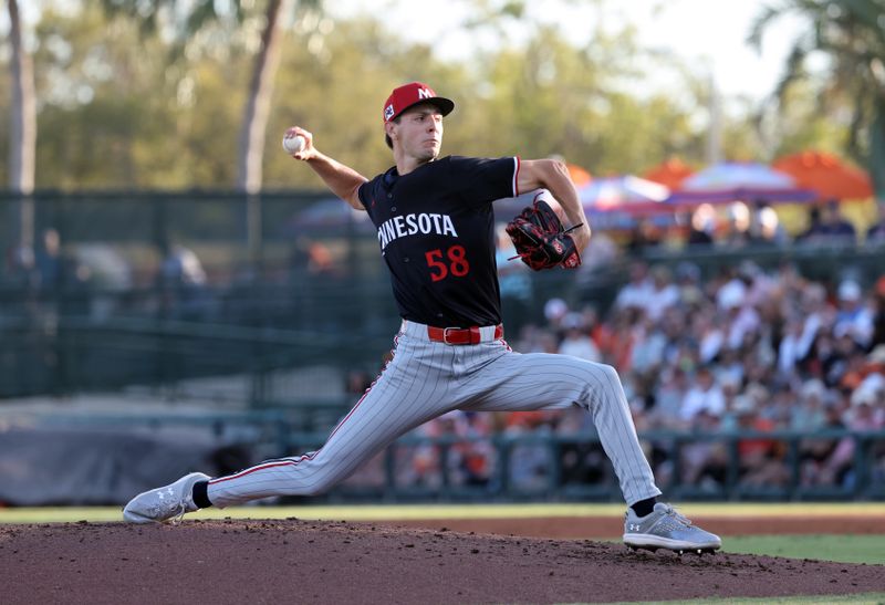 Mar 14, 2025; Sarasota, Florida, USA;  Minnesota Twins starting pitcher David Festa (58) throws a pitch during the second inning against the Baltimore Orioles at Ed Smith Stadium. Mandatory Credit: Kim Klement Neitzel-Imagn Images