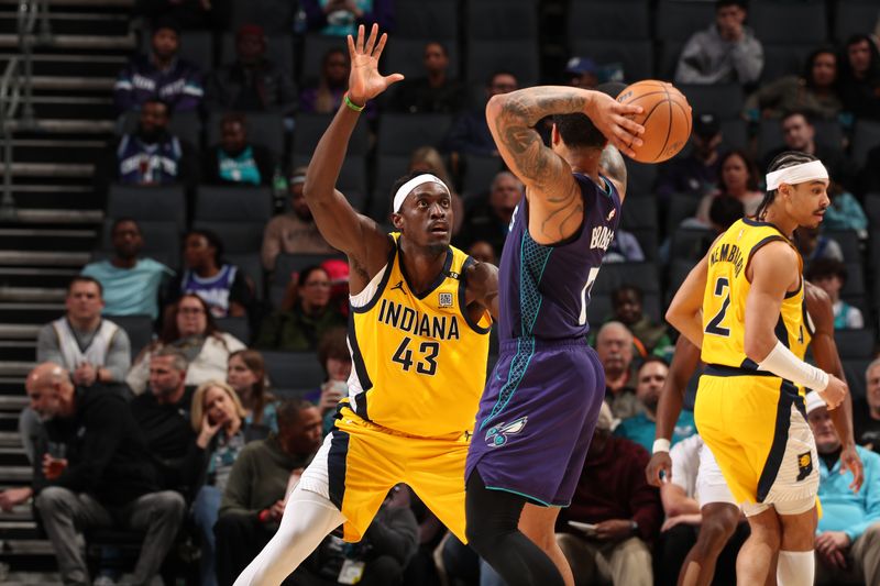 CHARLOTTE, NC - February 12: Pascal Siakam #43 of the Indiana Pacers plays defense against the Charlotte Hornets on February 12, 2024 at Spectrum Center in Charlotte, North Carolina. NOTE TO USER: User expressly acknowledges and agrees that, by downloading and or using this photograph, User is consenting to the terms and conditions of the Getty Images License Agreement. Mandatory Copyright Notice: Copyright 2024 NBAE (Photo by Kent Smith/NBAE via Getty Images)