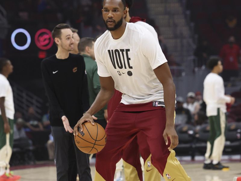CLEVELAND, OH - NOVEMBER 4:  Evan Mobley #4 of the Cleveland Cavaliers warms up before the game against the Milwaukee Bucks on November 4, 2024 at Rocket Mortgage FieldHouse in Cleveland, Ohio. NOTE TO USER: User expressly acknowledges and agrees that, by downloading and/or using this Photograph, user is consenting to the terms and conditions of the Getty Images License Agreement. Mandatory Copyright Notice: Copyright 2024 NBAE (Photo by  Lauren Leigh Bacho/NBAE via Getty Images)