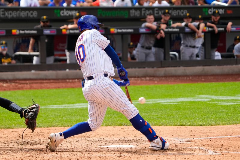 Aug 16, 2023; New York City, New York, USA; New York Mets center fielder Rafael Ortega (30) hits an RBI single during the seventh inning at Citi Field. Mandatory Credit: Gregory Fisher-USA TODAY Sports