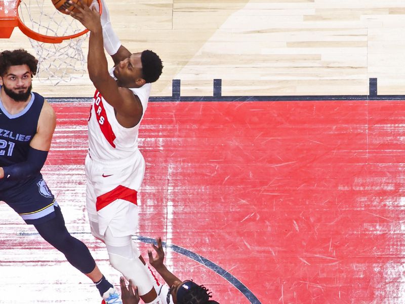 TORONTO, CANADA - JANUARY 22: RJ Barrett #9 of the Toronto Raptors drives to the basket during the game against the Memphis Grizzlies on January 22, 2024 at the Scotiabank Arena in Toronto, Ontario, Canada.  NOTE TO USER: User expressly acknowledges and agrees that, by downloading and or using this Photograph, user is consenting to the terms and conditions of the Getty Images License Agreement.  Mandatory Copyright Notice: Copyright 2024 NBAE (Photo by Vaughn Ridley/NBAE via Getty Images)