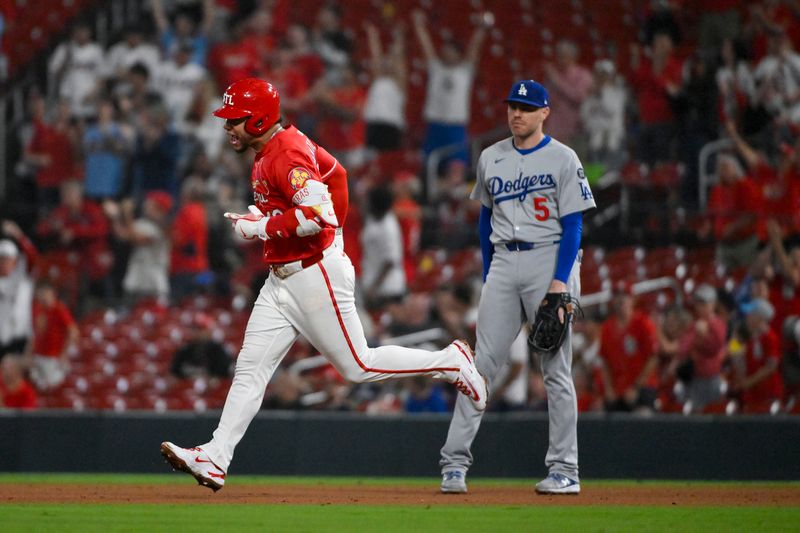 Jun 6, 2025; St. Louis, Missouri, USA;  St. Louis Cardinals first baseman Willson Contreras (40) reacts as he runs the bases after hitting a solo home run against the Los Angeles Dodgers during the eighth inning at Busch Stadium. Mandatory Credit: Jeff Curry-Imagn Images