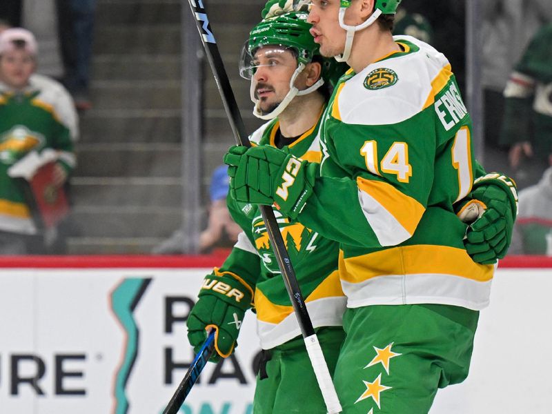 Mar 3, 2026; Saint Paul, Minnesota, USA;  Minnesota Wild forward Mats Zuccarello (36) is congratulated by forward Joel Eriksson Ek (14) on his power play goal against the Tampa Bay Lightning during the second period at Grand Casino Arena. Mandatory Credit: Nick Wosika-Imagn Images