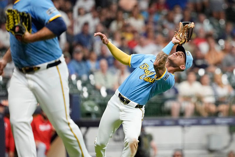 Jul 12, 2024; Milwaukee, Wisconsin, USA;  Milwaukee Brewers third baseman Joey Ortiz (3) catches a pop fly ball during the ninth inning against the Washington Nationals at American Family Field. Mandatory Credit: Jeff Hanisch-USA TODAY Sports