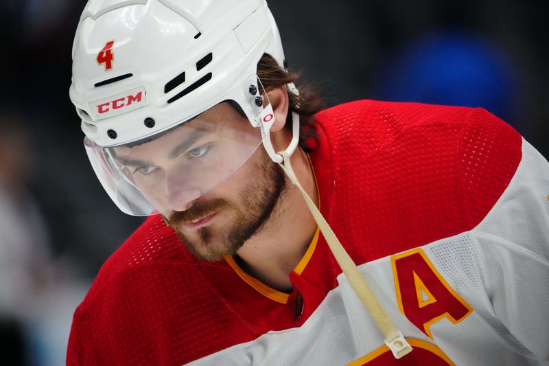 Dec 11, 2023; Denver, Colorado, USA; Calgary Flames defenseman Rasmus Andersson (4) before the game against the Colorado Avalanche at Ball Arena. Mandatory Credit: Ron Chenoy-USA TODAY Sports