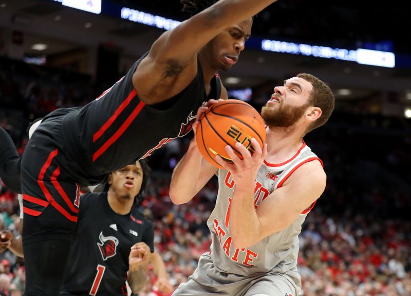 Jan 3, 2024; Columbus, Ohio, USA; Ohio State Buckeyes forward Jamison Battle (10) is fouled by Rutgers Scarlet Knights forward Antwone Woolfolk (13) during the second half at Value City Arena. Mandatory Credit: Joseph Maiorana-USA TODAY Sports