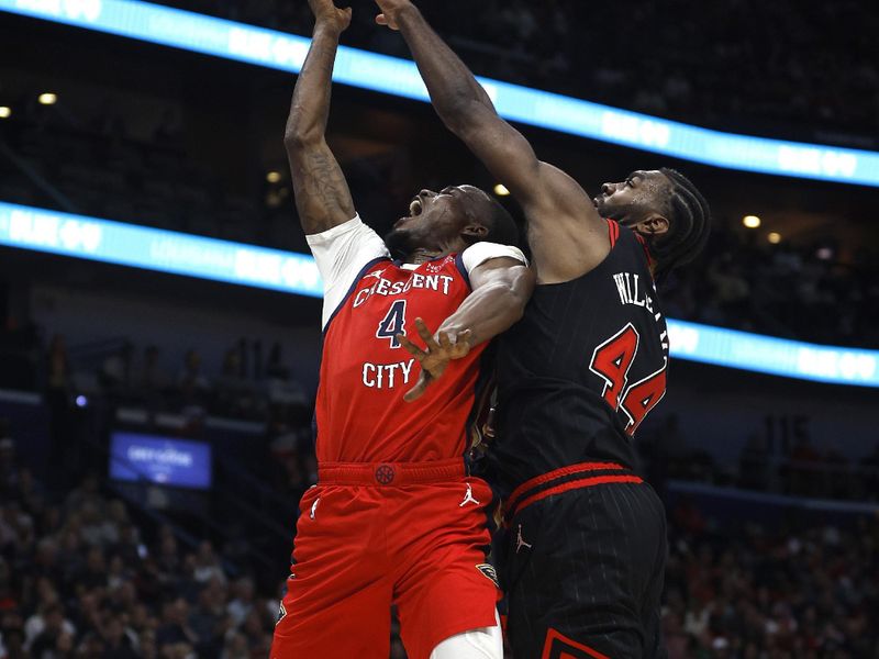 NEW ORLEANS, LOUISIANA - OCTOBER 23: Javonte Green #4 of the New Orleans Pelicans is fouled by Patrick Williams #44 of the Chicago Bulls during the fourth quarter of an NBA game at Smoothie King Center on October 23, 2024 in New Orleans, Louisiana. NOTE TO USER: User expressly acknowledges and agrees that, by downloading and or using this photograph, User is consenting to the terms and conditions of the Getty Images License Agreement. (Photo by Sean Gardner/Getty Images)