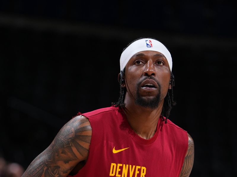 DENVER, CO - MARCH 5: Kentavious Caldwell-Pope #5 of the Denver Nuggets warms up before the game against the Phoenix Suns on March 5, 2024 at the Ball Arena in Denver, Colorado. NOTE TO USER: User expressly acknowledges and agrees that, by downloading and/or using this Photograph, user is consenting to the terms and conditions of the Getty Images License Agreement. Mandatory Copyright Notice: Copyright 2024 NBAE (Photo by Garrett Ellwood/NBAE via Getty Images)