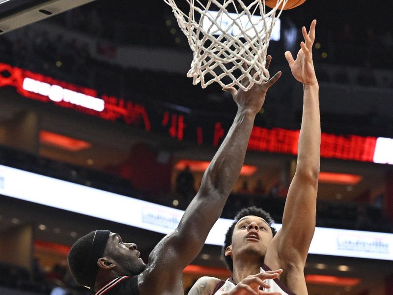 Mar 5, 2024; Louisville, Kentucky, USA; Virginia Tech Hokies center Lynn Kidd (15) shoots against Louisville Cardinals forward Brandon Huntley-Hatfield (5) during the first half at KFC Yum! Center. Mandatory Credit: Jamie Rhodes-USA TODAY Sports