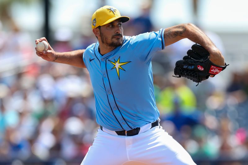 Mar 11, 2024; Port Charlotte, Florida, USA;  Tampa Bay Rays starting pitcher Zach Eflin (24) throws a pitch against the Toronto Blue Jays in the first inning at Charlotte Sports Park. Mandatory Credit: Nathan Ray Seebeck-USA TODAY Sports