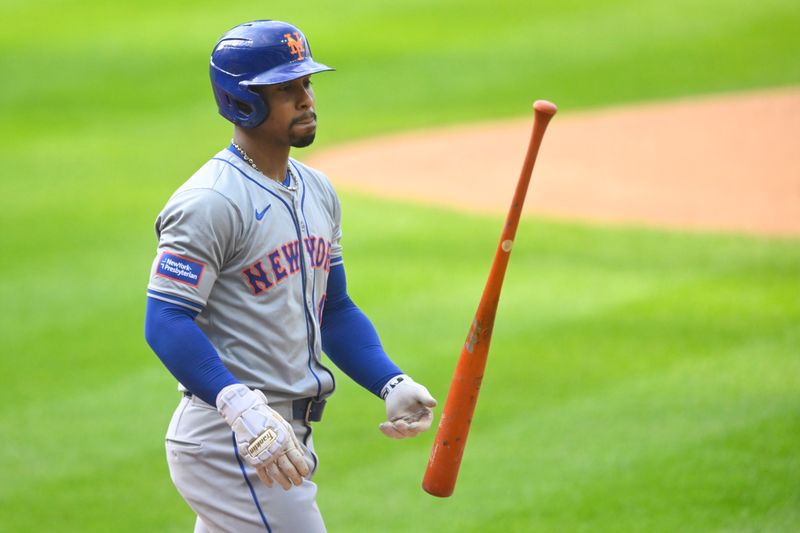 May 20, 2024; Cleveland, Ohio, USA; New York Mets shortstop Francisco Lindor (12) reacts after striking out in the first inning against the Cleveland Guardians at Progressive Field. Mandatory Credit: David Richard-USA TODAY Sports