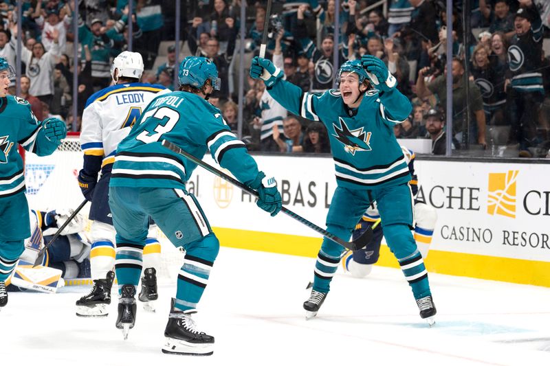 Oct 10, 2024; San Jose, California, USA; San Jose Sharks center Macklin Celebrini (71) reacts after center Tyler Toffoli (73) scores a goal during the first period against the St. Louis Blues at SAP Center at San Jose. Mandatory Credit: Stan Szeto-Imagn Images