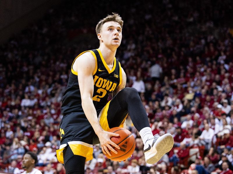 Jan 30, 2024; Bloomington, Indiana, USA; Iowa Hawkeyes guard Brock Harding (2) shoots the ball in the second half against the Indiana Hoosiers at Simon Skjodt Assembly Hall. Mandatory Credit: Trevor Ruszkowski-USA TODAY Sports