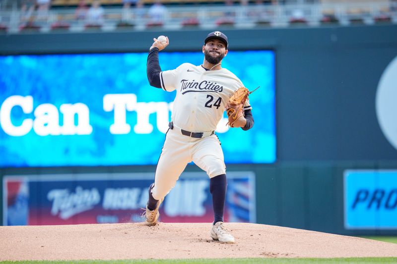 Sep 21, 2025; Minneapolis, Minnesota, USA; Minnesota Twins starting pitcher Simeon Woods Richardson (24) pitches to Cleveland Guardians outfielder Steven Kwan (not shown) in the first inning at Target Field. Mandatory Credit: Matt Blewett-Imagn Images