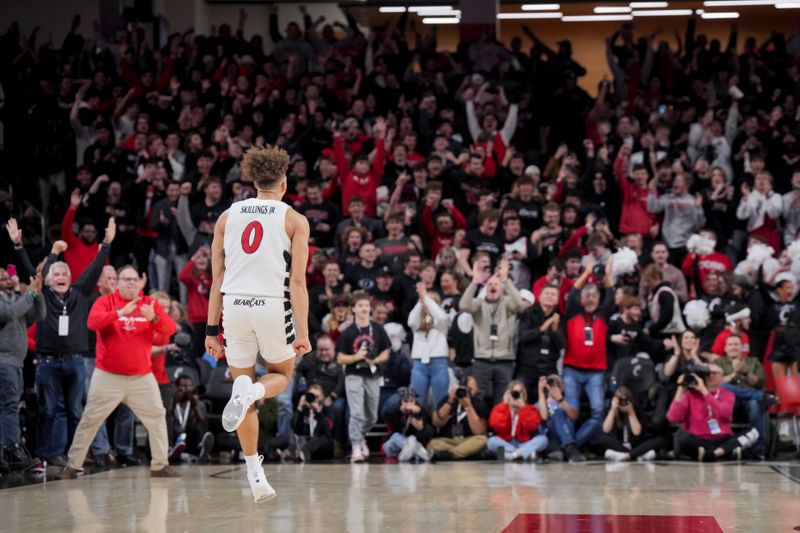 Jan 16, 2024; Cincinnati, Ohio, USA;  Cincinnati Bearcats guard Dan Skillings Jr. (0) reacts to defeating the TCU Horned Frogs as time expires in overtime at Fifth Third Arena. Mandatory Credit: Aaron Doster-USA TODAY Sports