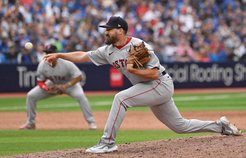 Sep 16, 2023; Toronto, Ontario, CAN; Boston Red Sox relief pitcher John Schreiber (46) pitches against the Toronto Blue Jays in the ninth inning at Rogers Centre. Mandatory Credit: Dan Hamilton-USA TODAY Sports