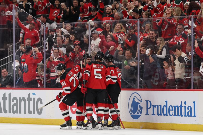 Oct 16, 2025; Newark, New Jersey, USA; New Jersey Devils right wing Timo Meier (28) celebrates his goal against the Florida Panthers during the third period at Prudential Center. Mandatory Credit: Ed Mulholland-Imagn Images